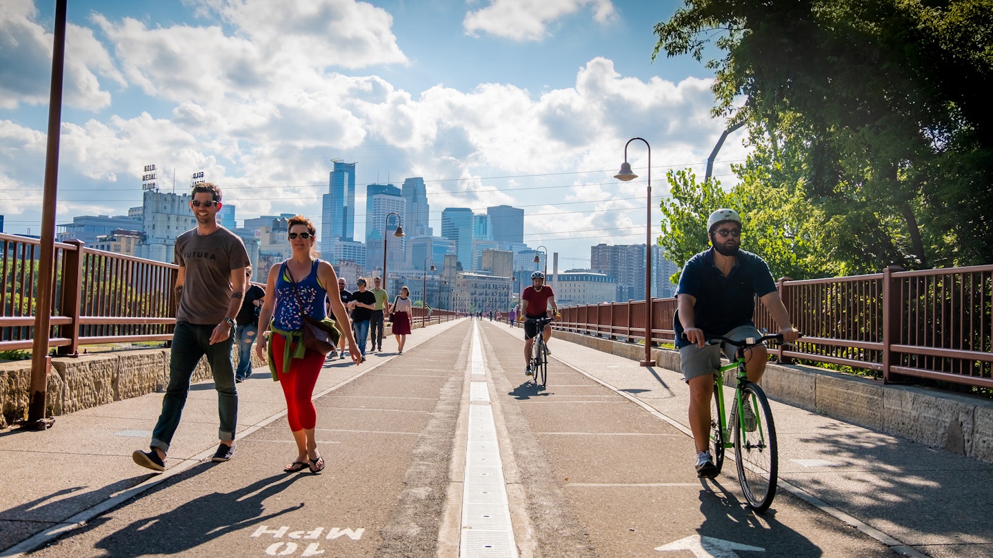 street view on Stone Arch Bridge in Minneapolis, Minnesota - July 24, 2017: USA; Shutterstock ID 1964255125; your: Tasmin Waby; gl: 65050; netsuite: Online Editorial; full: Demand Project